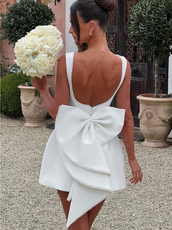 Baby Boo Dresses & Skirts - Backless White Mini Dress with Pearl-Trim Bow